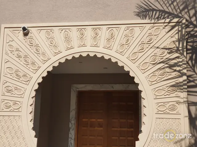 Ornate carved arch doorway by Tradezone